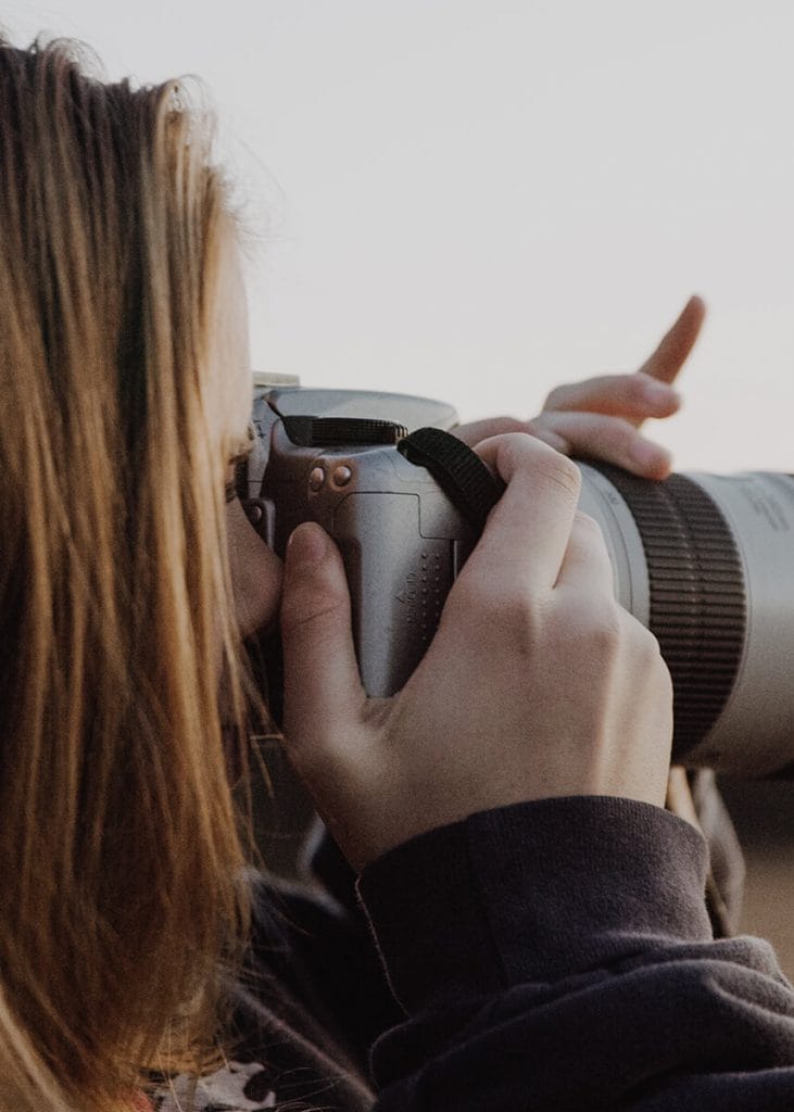 woman-taking-photos-731x1024